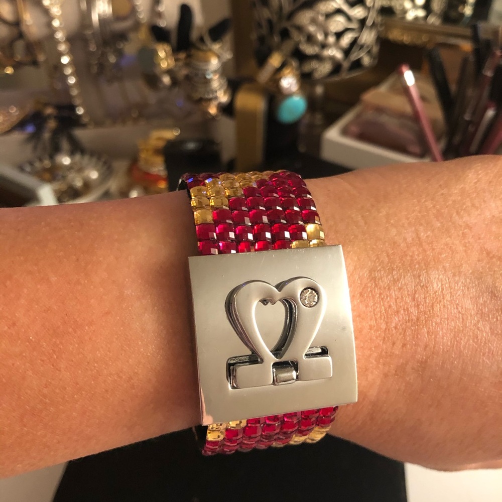 Multi color band bracelet.